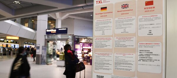 A poster with information about the coronavirus (2019-nCoV) is displayed at Tegel Airport in Berlin, Germany, January 26, 2020. A poster with information about the coronavirus (2019-nCoV) is displayed at Tegel Airport in Berlin, Germany, January 26, 2020. - Sputnik International