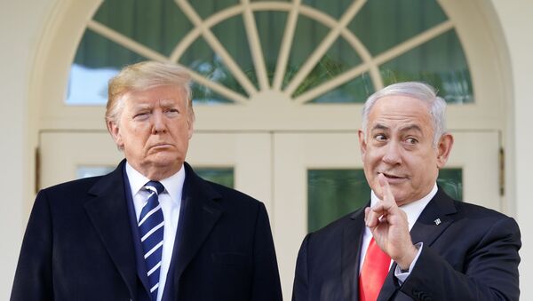 U.S. President Donald Trump listens as he welcomes Israel's Prime Minister Benjamin Netanyahu at the White House in Washington, U.S., January 27, 2020.  - Sputnik International
