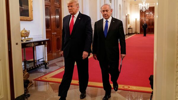 U.S. President Donald Trump and Israel's Prime Minister Benjamin Netanyahu arrive to deliver joint remarks on a Middle East peace plan proposal in the East Room of the White House in Washington, U.S., January 28, 2020. - Sputnik International