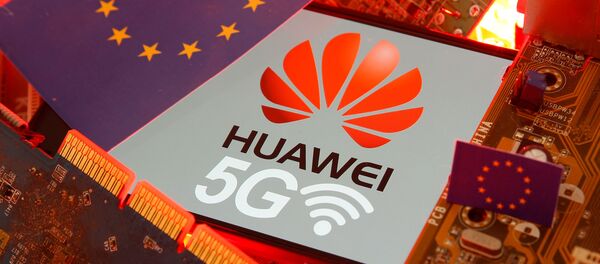The EU flag and a smartphone with the Huawei and 5G network logo are seen on a PC motherboard in this illustration taken January 29, 2020. - Sputnik International