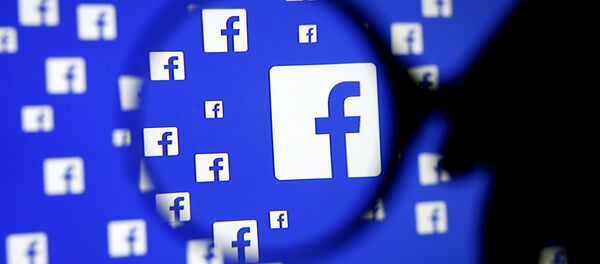 A man poses with a magnifier in front of a Facebook logo on display in this illustration taken in Sarajevo, Bosnia and Herzegovina, December 16, 2015 A man poses with a magnifier in front of a Facebook logo on display in this illustration taken in Sarajevo, Bosnia and Herzegovina, December 16, 2015 - Sputnik International