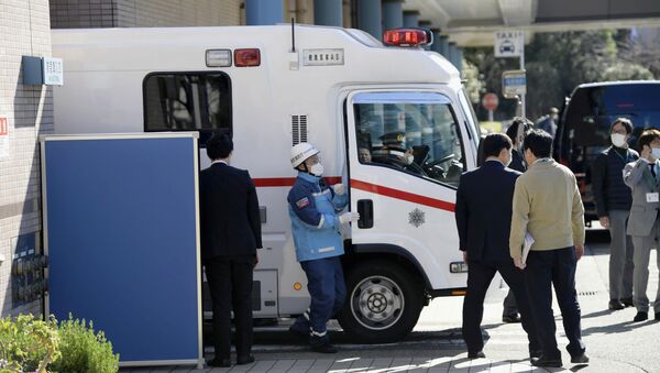 An ambulance carrying a Japanese national who evacuated from Wuhan by a chartered plane, arrives at a hospital in Tokyo, Japan in this photo taken by Kyodo January 30, 2020 - Sputnik International