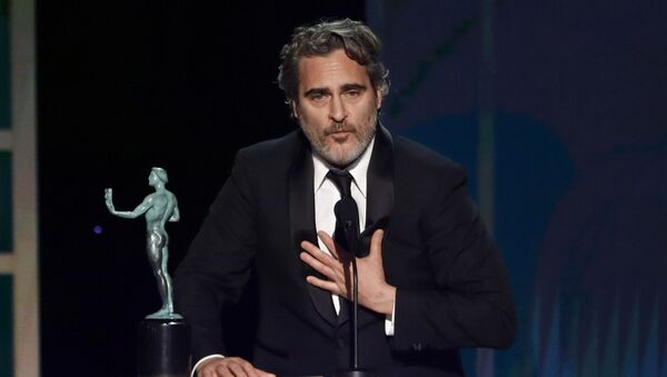 26th Screen Actors Guild Awards - Show - Los Angeles, California, U.S., January 19, 2020 - Joaquin Phoenix accepts the award for Outstanding Performance by a Male Actor in a Leading Role for The Joker. - Sputnik International