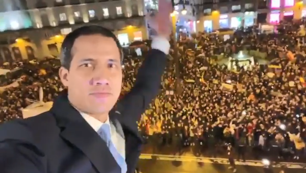 Venezuelan opposition figure Juan Guaido waves before a crowd in Madrid, Spain, on January 25, 2020 - Sputnik International