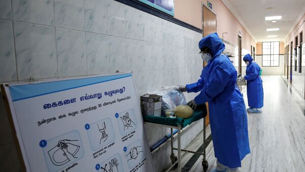 Medical staff with protective clothing are seen inside a ward specialised in receiving any person who may have been infected with coronavirus, at the Rajiv Ghandhi Government General hospital in Chennai, India, January 29, 2020.  - Sputnik International