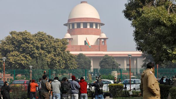 Television journalists are seen outside the premises of the Supreme Court in New Delhi, India, January 22, 2020.  - Sputnik International