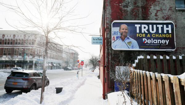 A billboard for Democratic 2020 U.S. presidential candidate and former U.S. Rep. John Delaney hangs in Des Moines, Iowa, U.S., January 18, 2020 - Sputnik International