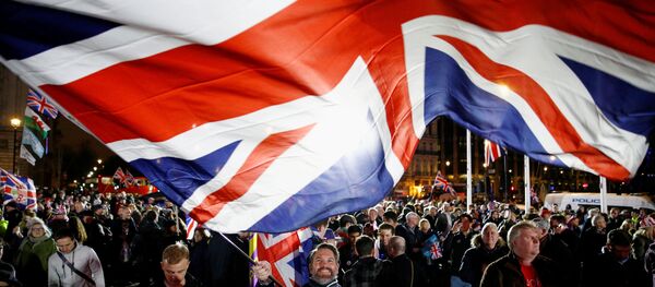 A man waves a British flag on Brexit day in London, Britain January 31, 2020 A man waves a British flag on Brexit day in London, Britain January 31, 2020 - Sputnik International