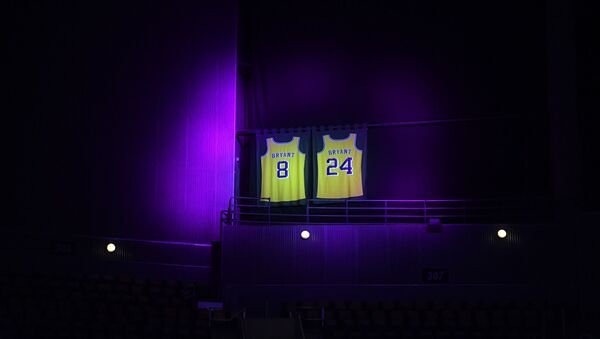 The jerseys of Los Angeles Lakers Kobe Bryant are lit with a purple spotlight for the game against the Portland Trail Blazers at Staples Center - Sputnik International