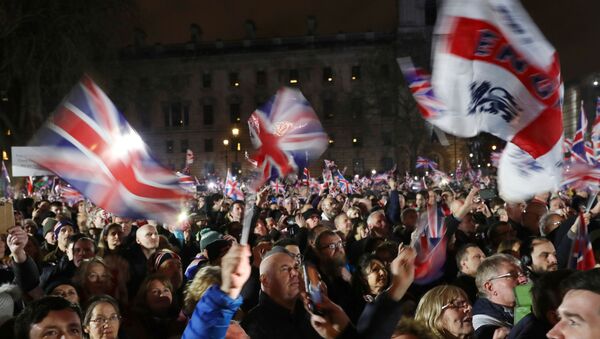 People celebrate in Parliament Square on Brexit day in London, Britain January 31, 2020.  - Sputnik International