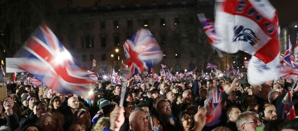 People celebrate in Parliament Square on Brexit day in London, Britain January 31, 2020.  - Sputnik International
