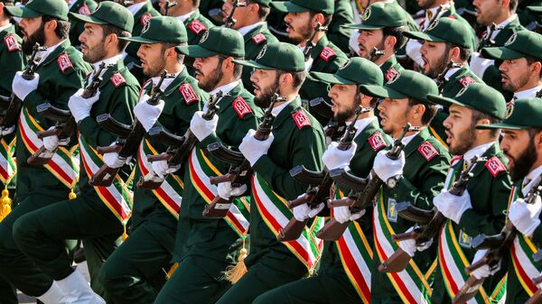 Members of Iran's Revolutionary Guards Corps (IRGC) marching during the annual military parade which markins the anniversary of the outbreak of the devastating 1980-1988 war with Saddam Hussein's Iraq, in the capital Tehran. - Sputnik International