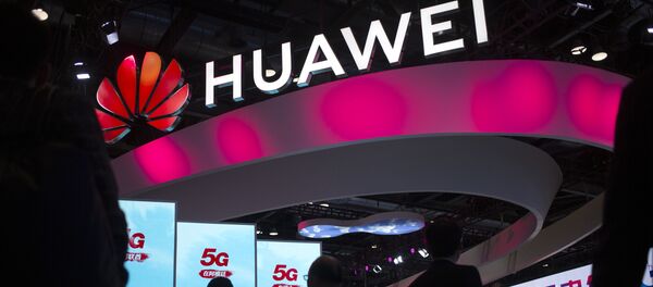 Chinese technology firm Huawei at the PT Expo in Beijing - Sputnik International