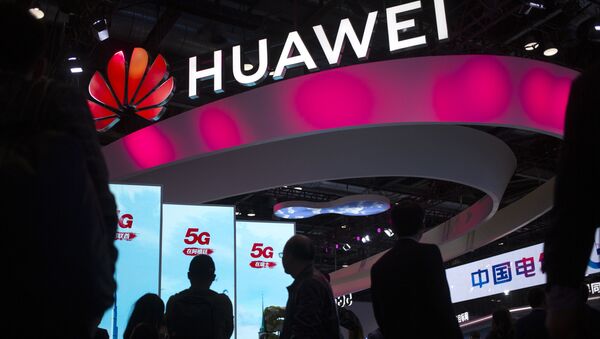 Chinese technology firm Huawei at the PT Expo in Beijing - Sputnik International