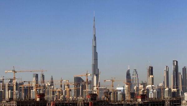 General view of Dubai's cranes at a construction site in Dubai, UAE - Sputnik International