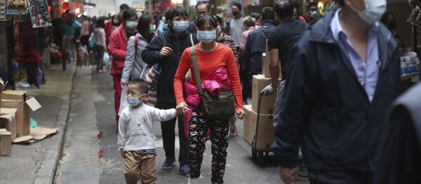 People visit the open market wearing face masks in hopes to prevent contracting the spreading coronavirus in Hong Kong People visit the open market wearing face masks in hopes to prevent contracting the spreading coronavirus in Hong Kong - Sputnik International