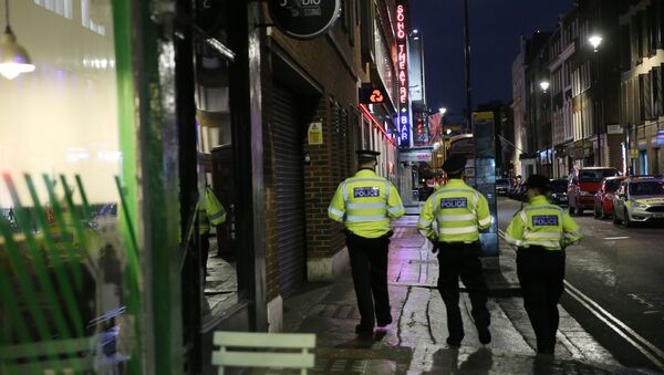 Police officers work in the Soho area of central London on February 3, 2020 after parts of the neighbourhood were evacuated - Sputnik International