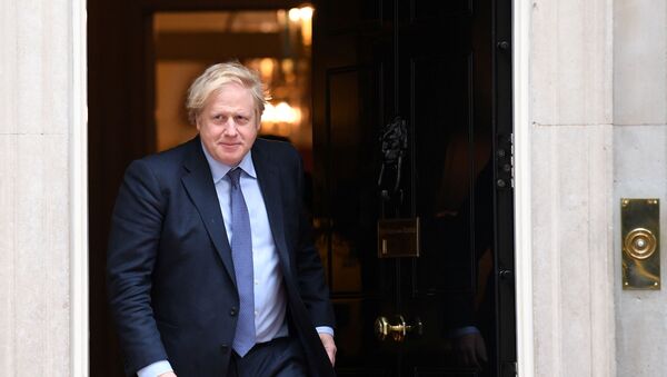 Britain's Prime Minister Boris Johnson goes out to welcome the Sultan of Brunei, Hassanal Bolkiah (not pictured), at Downing Street in London, Britain, February 4, 2020. Stefan Rousseau/Pool via REUTERS - Sputnik International