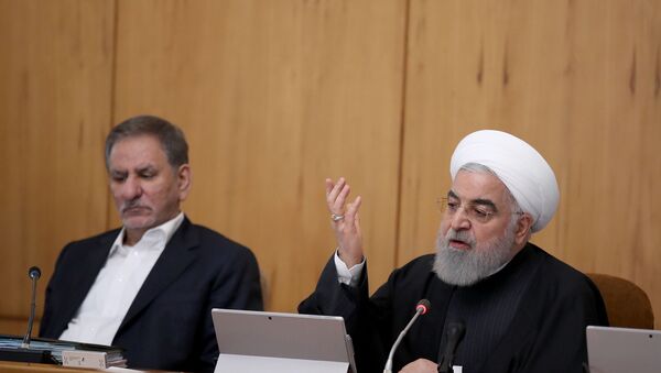 President Hassan Rouhani chairing a cabinet meeting, alongside Iranian Vice President Eshaq Jahangiri  - Sputnik International