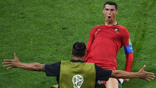 Portugal's Cristiano Ronaldo celebrates the goal during the World Cup Group B soccer match between Portugal and Spain at the Fisht stadium in Sochi, Russia, June 15, 2018. - Sputnik International