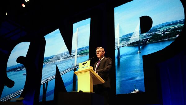Derek Mackay, Scotland's Minsiter for Finance and the Constitution, and SNP MSP, speaks on the final day of the Scottish National Party (SNP) annual conference in Glasgow on October 9, 2018 - Sputnik International