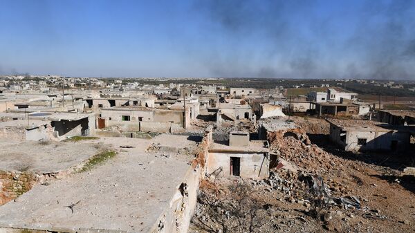 Smoke rises over the Deir Sharqi village, about four kilometres from the town of Maarrat al-Numan, southern Idlib province, Syria. Deir Sharqi and some other jihadist-held villages near the key town Maarrat al-Numan were captured by Syrian army forces.  - Sputnik International