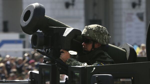 Ukrainian soldier armed with US Javelin ride along Khreshchatyk Street, during a military parade to celebrate Independence Day in Kiev, Ukraine. File photo - Sputnik International