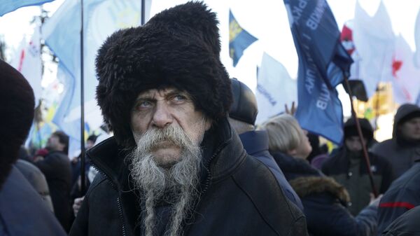 Участник протеста в Киеве, Украина - Sputnik International