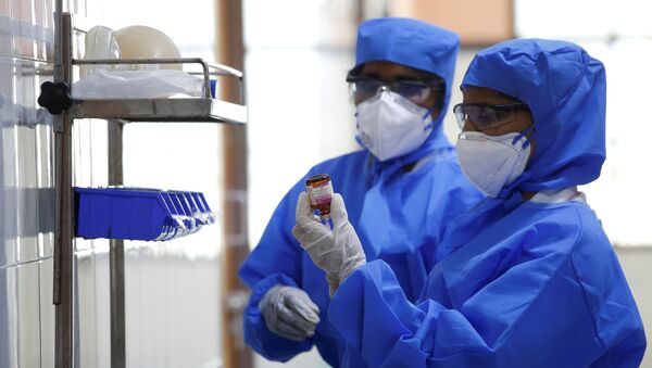 Medical staff with protective clothing are seen inside a ward specialised in receiving any person who may have been infected with coronavirus, at the Rajiv Ghandhi Government General hospital in Chennai, India, January 29, 2020.  - Sputnik International
