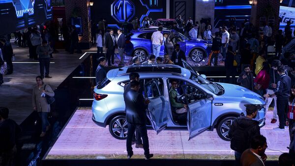 The MG Motor ZS EV pure-electric car is displayed on stage at the Auto Expo 2020 at Greater Noida on the outskirts of New Delhi on February 6, 2020 - Sputnik International