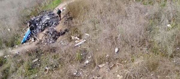 The site of the helicopter crash that killed Kobe Bryant and eight others is seen in a screen grab from drone footage taken in Calabasas, California, U.S. January 27, 2020 and released by the National Transportation Safety Board - Sputnik International