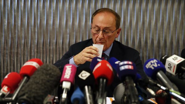 French Ice Skating Federation (FFSG) president Didier Gailhaguet takes a drink as he speaks to the media during a press conference in Paris, Wednesday, Feb. 5, 2020 - Sputnik International