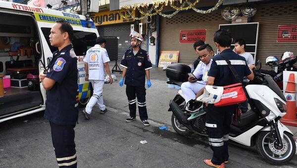 Paramedics and volunteers remain on standby outside the Terminal 21 mall, after a gunman involved in a mass shooting in the mall was confirmed dead, in the Thai northeastern city of Nakhon Ratchasima on February 9, 2020 - Sputnik International