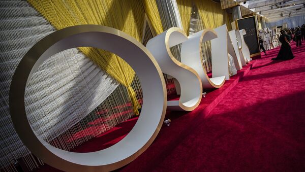 The Oscars sign and decoration is seen on the red carpet on the eve of the 92nd Oscars, February 8, 2020 - Sputnik International
