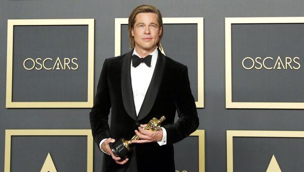 Best Supporting Actor Brad Pitt poses with the Oscar in the photo room during the 92nd Academy Awards in Hollywood, Los Angeles, California, U.S., February 9, 2020.  - Sputnik International
