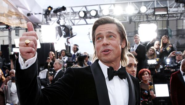 Brad Pitt gestures as he poses on the red carpet during the Oscars arrivals at the 92nd Academy Awards in Hollywood, Los Angeles, California, U.S., February 9, 2020 - Sputnik International