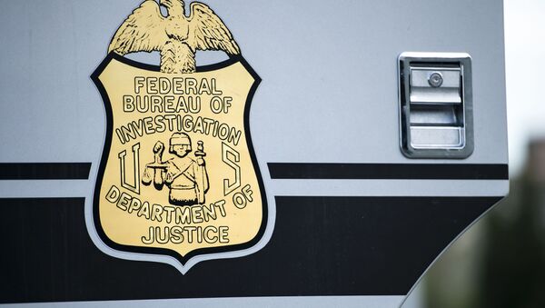 A seal on a door to a Federal Bureau of Investigation mobile command vehicle is seen during an FBI field training exercise at the Landmark Mall May 2, 2014 in Alexandria, Virginia.  - Sputnik International