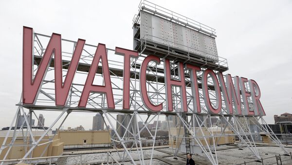 In this Wednesday, Dec. 9, 2015, photo, the iconic Watchtower sign is seen on the roof of 25-30 Columbia Heights, the current world headquarters of the Jehovah's Witnesses, in the Brooklyn borough of New York. This building is one of three large properties being sold by the Jehovah's Witnesses in a crowded area near the Brooklyn waterfront - Sputnik International