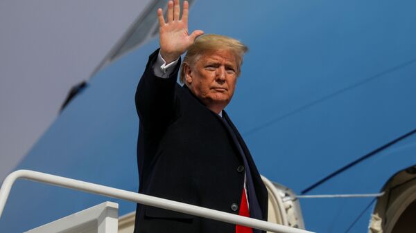 U.S. President Donald Trump boards Air Force One as he departs Washington for travel to Michigan at Joint Base Andrews, Maryland, U.S. January 30, 2020. - Sputnik International