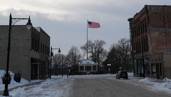 An American flag waves from a pole down a street in Fort Dodge, Iowa - Sputnik International