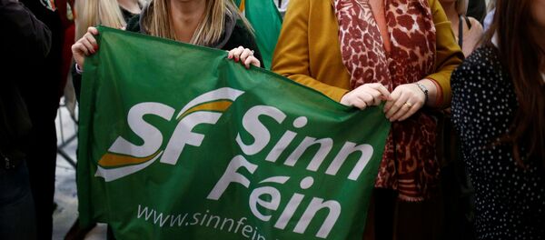Sinn Fein supporters react after exit polls were announced in Ireland's national election - Sputnik International