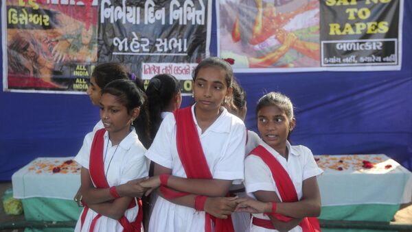 Indian students perform a play during a protest against sexual violence against women in Ahmadabad, India, Monday, Dec. 16, 2019 - Sputnik International