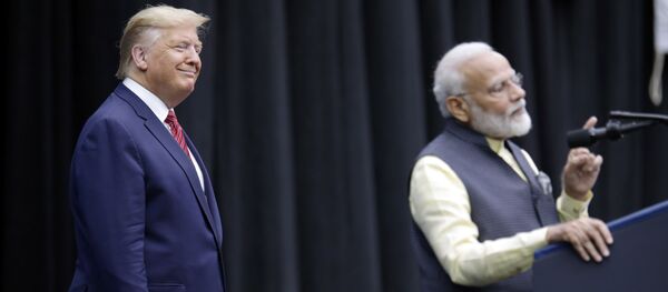 President Donald Trump listens as India Prime Minister Narendra Modi introduces him President Donald Trump listens as India Prime Minister Narendra Modi introduces him - Sputnik International