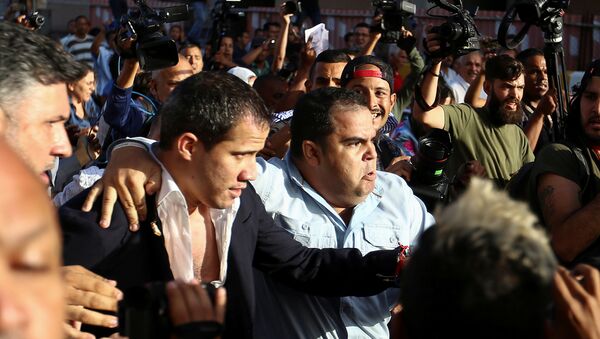 Venezuela's opposition leader Juan Guaido, who many nations have recognized as the country's rightful interim ruler, arrives at the Simon Bolivar international airport in Maiquetia, Venezuela February 11, 2020 - Sputnik International