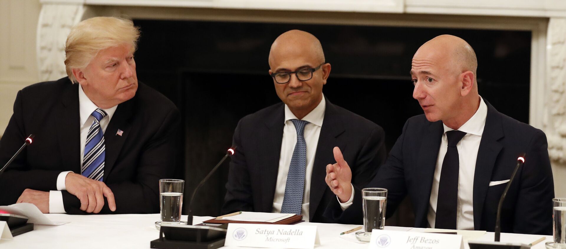 FILE - In this June 19, 2017, file photo, President Donald Trump, from left, and Satya Nadella, Chief Executive Officer of Microsoft, listen as Jeff Bezos, Chief Executive Officer of Amazon, speaks during an American Technology Council roundtable in the State Dinning Room of the White House in Washington - Sputnik International, 1920, 15.02.2020