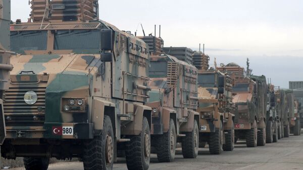 Turkish military vehicles are seen in Hazano near Idlib, Syria, February 11, 2020 - Sputnik International