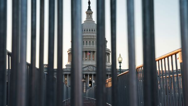 The U.S. Capitol building exterior is seen at sunset as members of the Senate participate in the first day of the impeachment trial of President Donald Trump in Washington, U.S., January 21, 2020. - Sputnik International