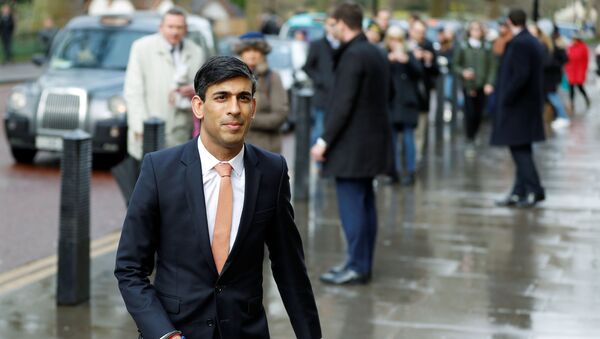 Newly appointed Britain's Chancellor of the Exchequer Rishi Sunak arrives at the Treasury in London, Britain, February 13, 2020 - Sputnik International