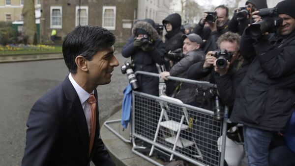 British lawmaker Rishi Sunak, and Chancellor of the Exchequer leaves 10 Downing Street, where he was given the job by Britain's Prime Minister Boris Johnson, as the former Chancellor Sajid Javid, resigned, in London, Thursday, Feb. 13, 2020 - Sputnik International