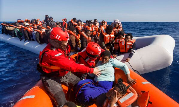 Members of the Spanish NGO Maydayterraneo prepare to sail back to the Aita Mari rescue boat after rescuing about 90 migrants in the Mediterranean open sea off the Libyan coast on February 9, 2020.  - Sputnik International